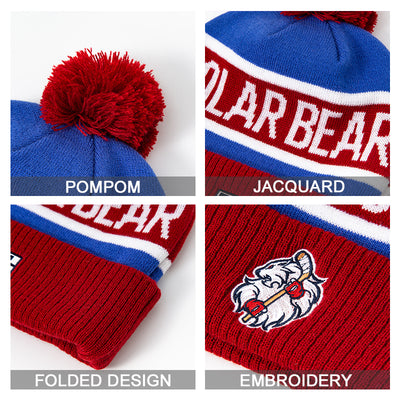 Blue and red knitted pompom beanie with fluffy red pompom and polar bear embroidery perfect for work uniforms