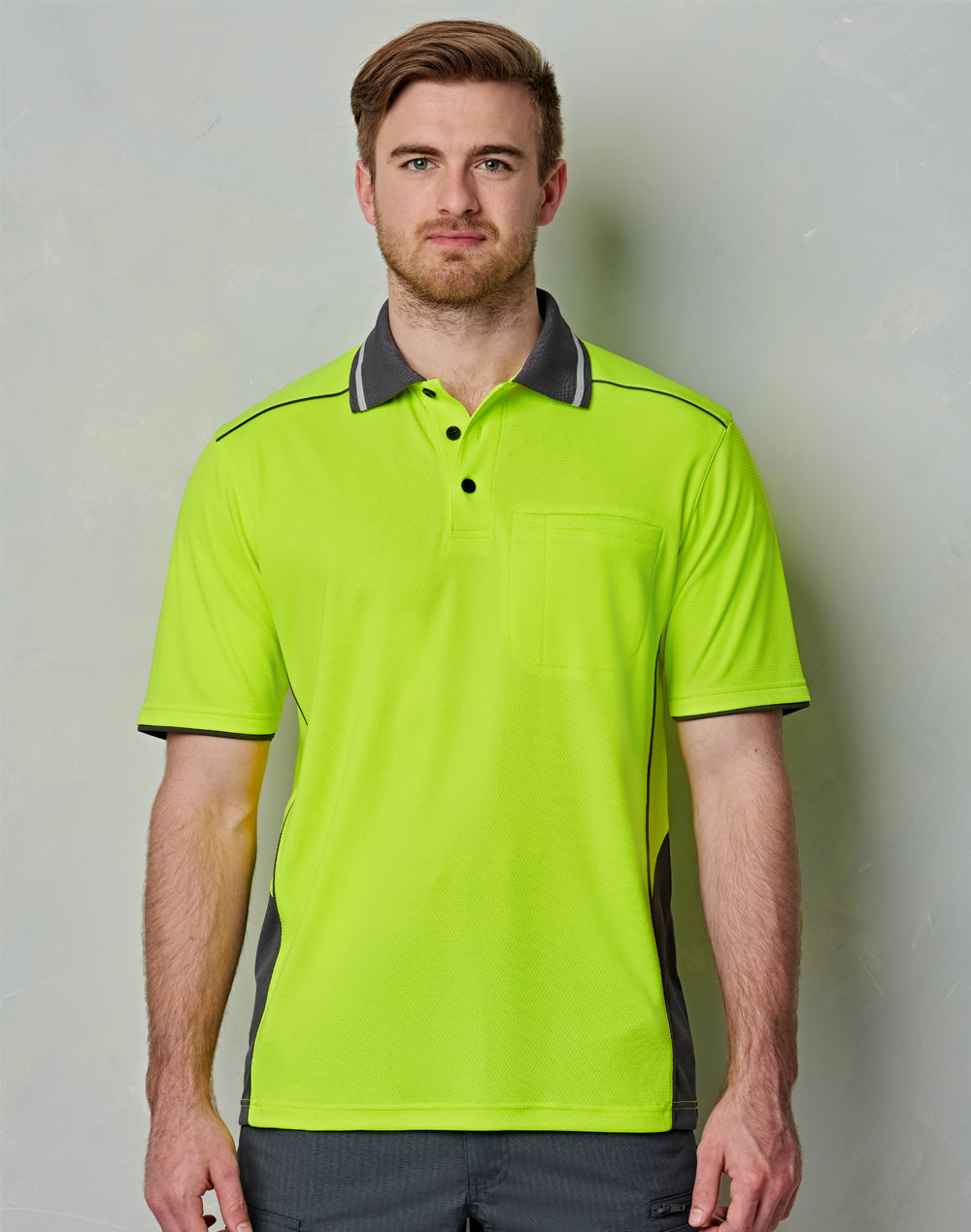 Bright neon green hi vis bamboo charcoal vented polo with dark gray collar perfect for workwear uniforms
