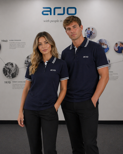 Navy blue arjo ladies contrast polo with white trim and embroidered logo ideal for workwear and uniforms