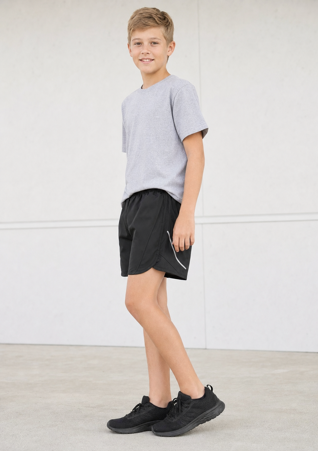 ST511K Tactic Kids Shorts in Black with reflective leg detail for school sport teams