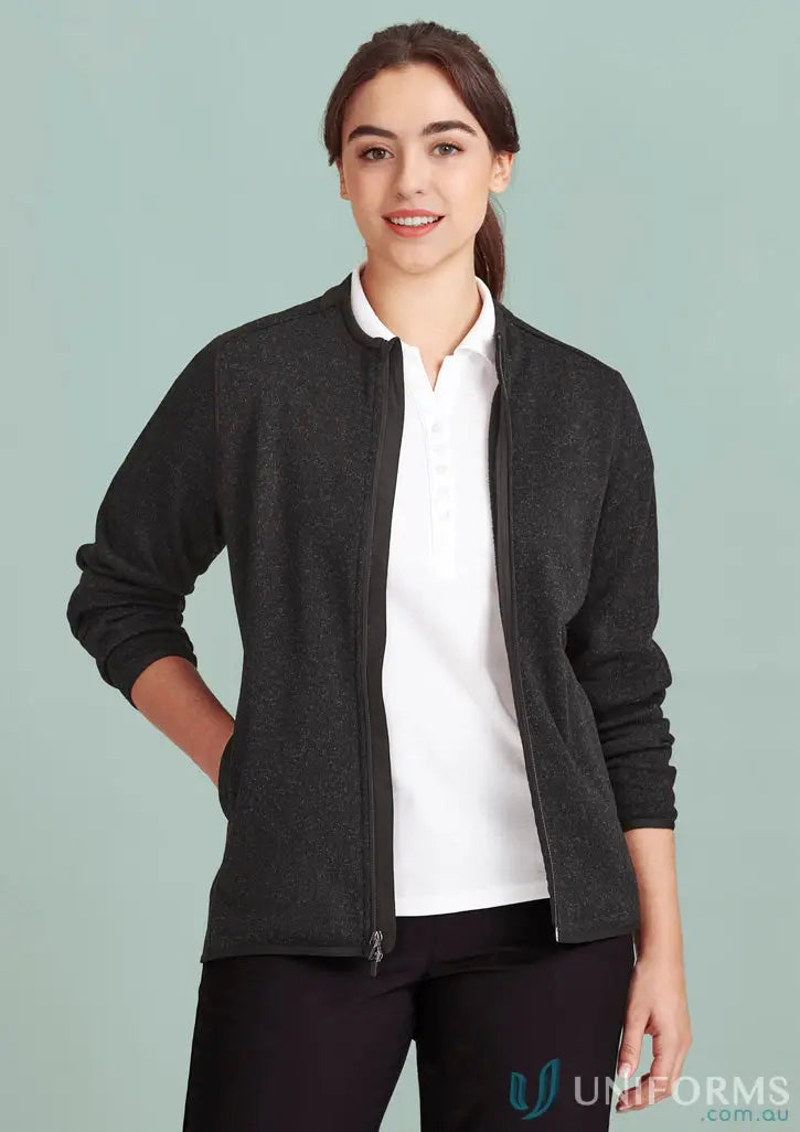 Smiling woman in Bizcare Women’s Nova Zip with antibacterial treatment jumper