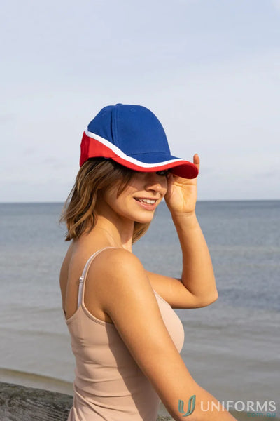 Woman in Brushed Heavy Cotton Tri Coloured Cap with blue, red, and white design