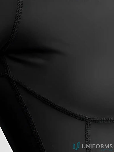 Black tactical uniform shirt with reinforced stitching and durable material.