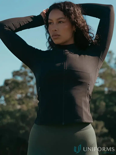 Brown zip-up athletic top with long sleeves and ribbed cuffs, likely made of polyester or nylon.