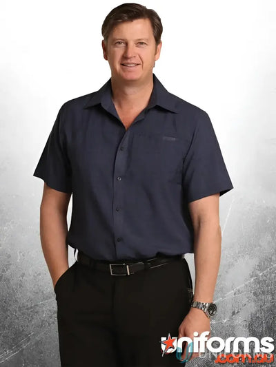 Man in navy cooldry short sleeve Winning Spirit M7600S Mens CoolDry shirt