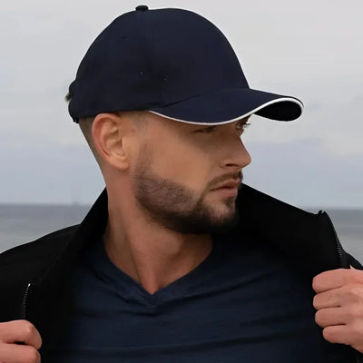 Navy blue cotton cap with white sandwich trim, custom imprint, 10 centimeter inch