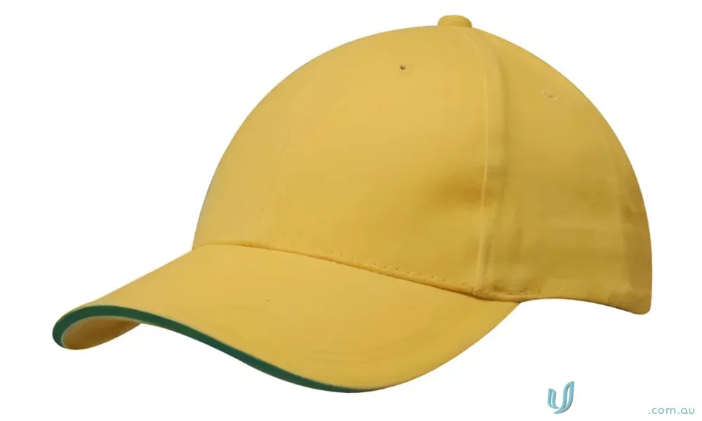 Yellow cotton cap with green trim and custom imprint, part of our wide stock range