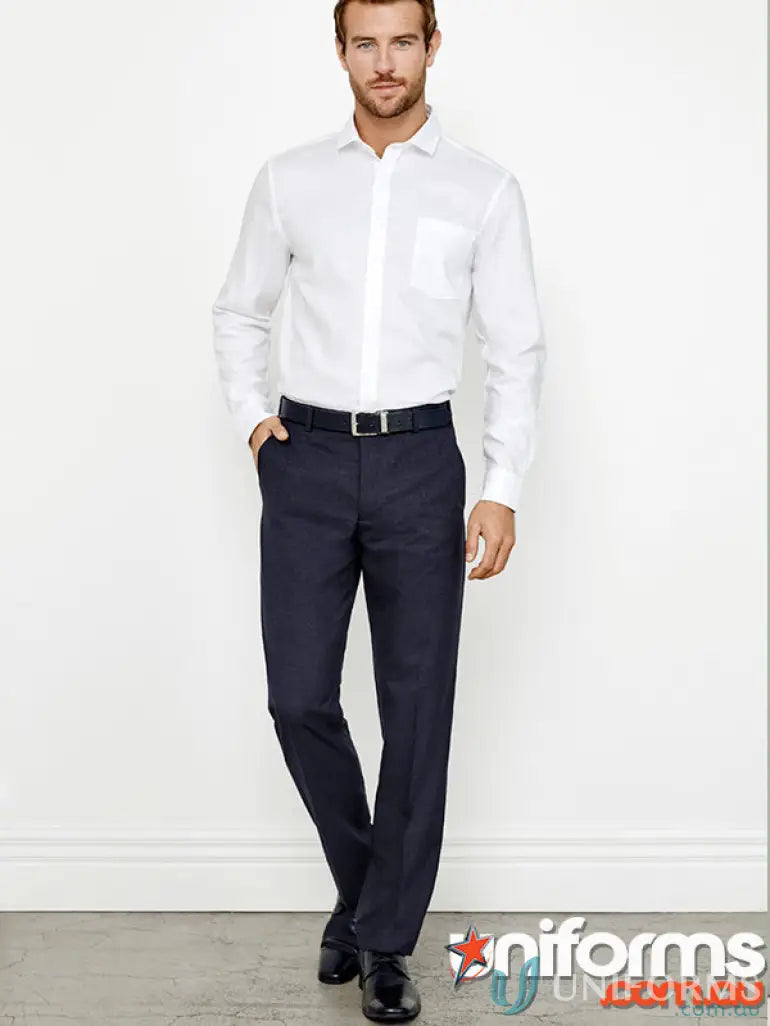 Man in white shirt and dark pants wearing CR Mens Flat Front Pant workwear