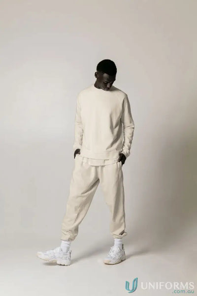 Man in beige archie crew sweat in unbrushed french terry for a comfy look