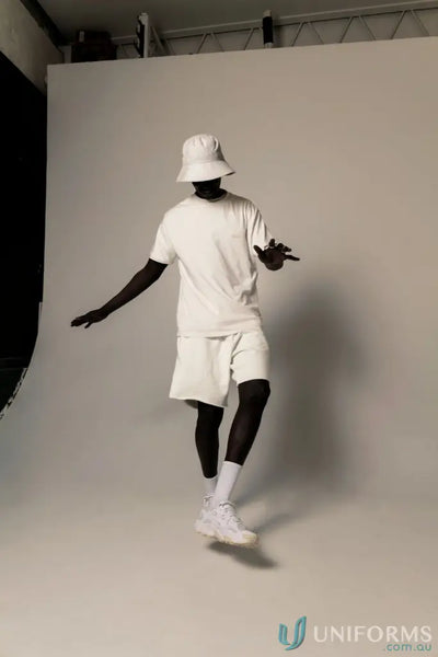 Person in white Retro Fit Donald Tee with higher ribbed neckline for a casual look
