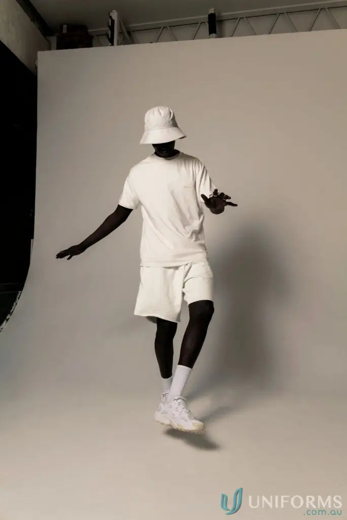 Person in white Retro Fit Donald Tee with higher ribbed neckline for a casual look