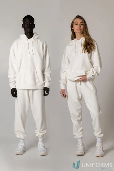 Two people wearing matching Tommy Trackpant PFD in brushed French terry material
