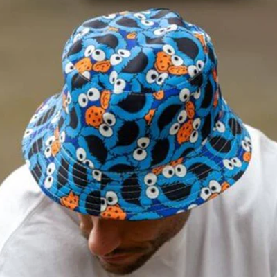 Cookie Monster mesh bucket hat with fun repeating faces