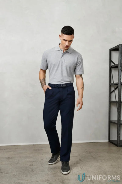 Man wearing Detroit Pant from Biz Collection Mens B S10110R in gray polo and navy pants