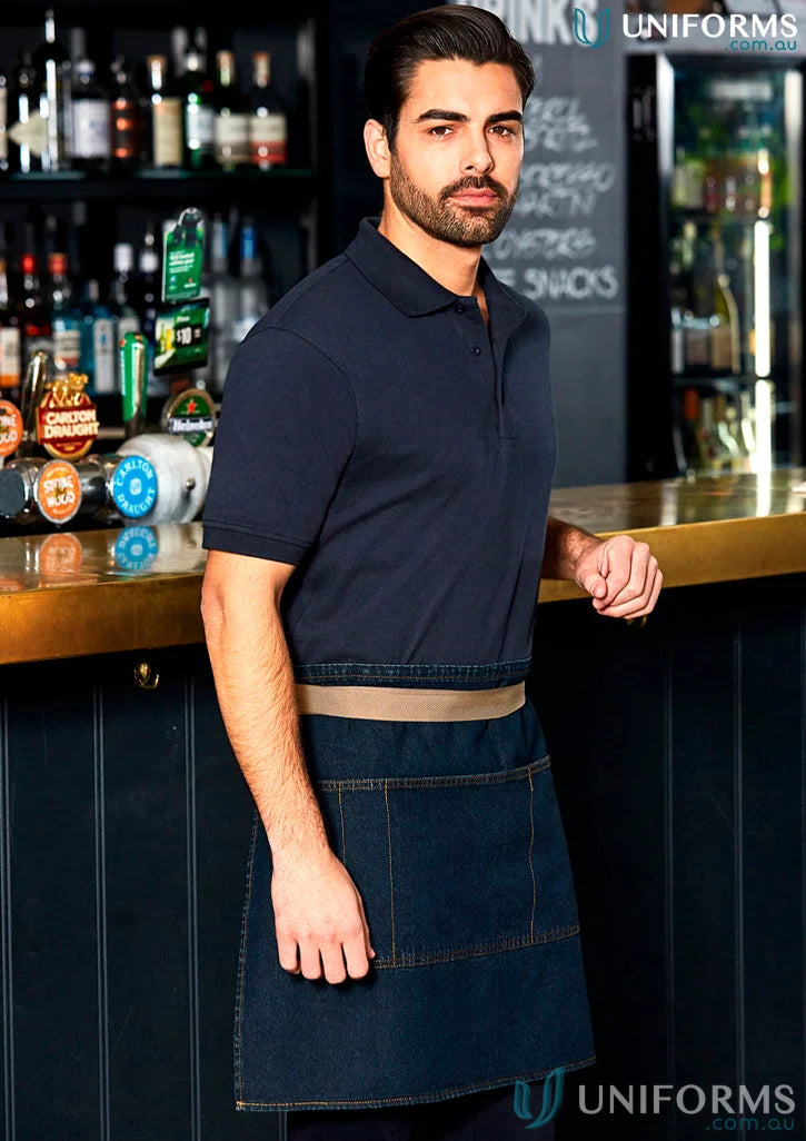 Man wearing navy blue polo and dark denim apron in East Village Half Denim Apron ap08 m3001