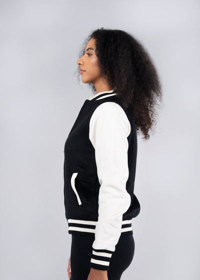 Black and white varsity wool blend ladies jacket with ribbed cuffs collar and waistband perfect for work uniforms