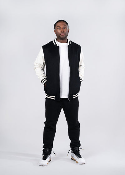 Black and white varsity wool blend jacket with ribbed collar and cuffs perfect for workwear or work uniforms