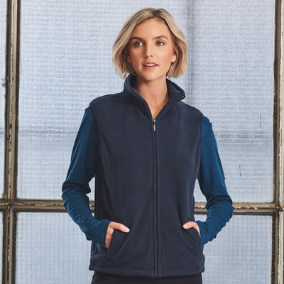 Navy blue Freedom polar fleece vest, teal anti-pill zip-up with long sleeves