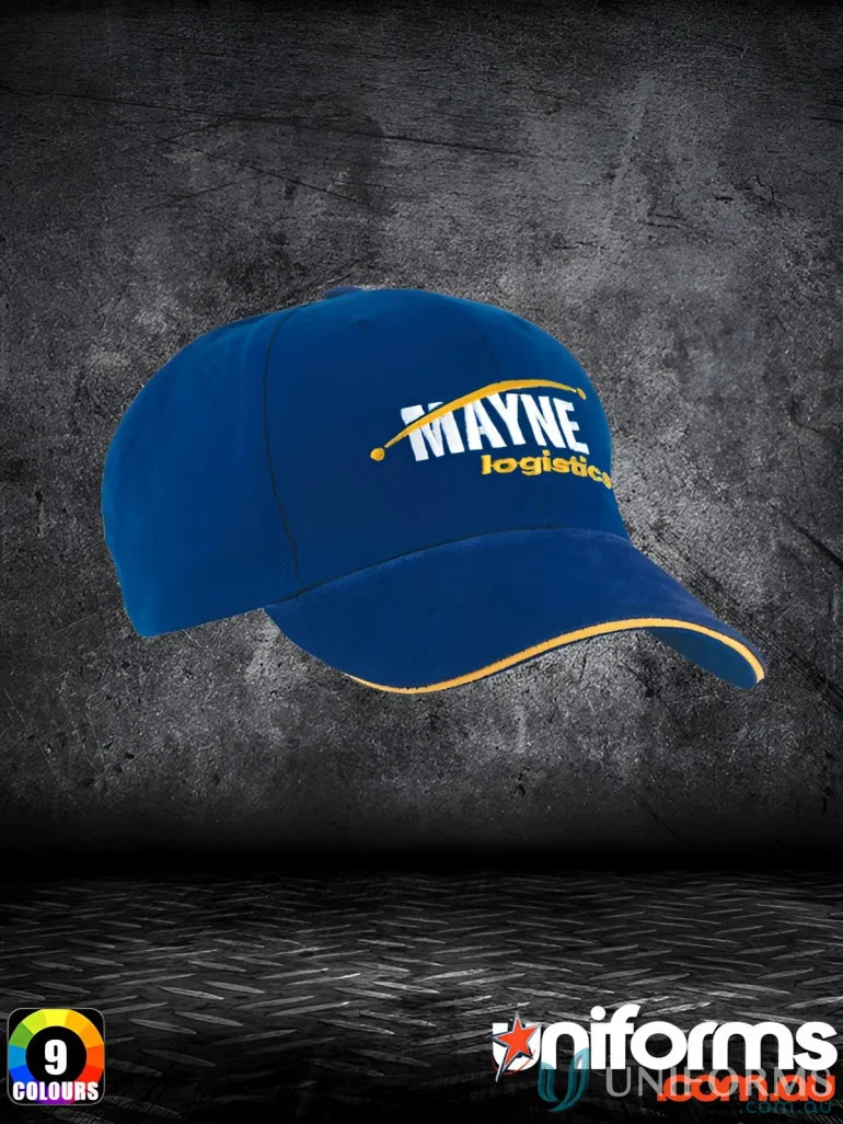 Blue baseball cap with yellow trim from HBC featuring suede peak and sandwich trim