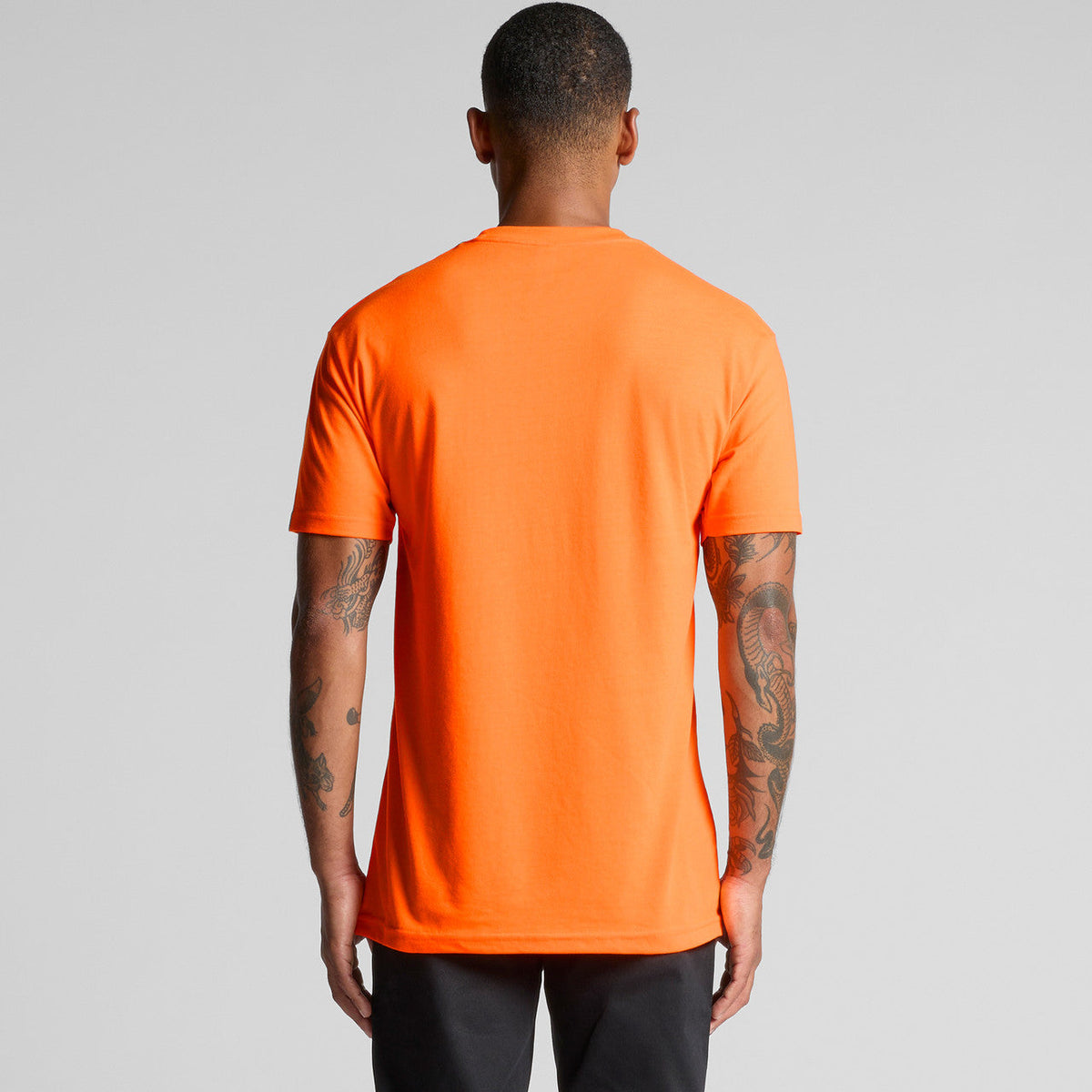 Neon orange athletic t-shirt with short sleeves and ribbed neckline, likely made of polyester or cotton blend.