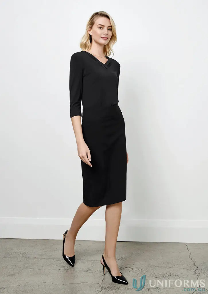Comfortable black knee-length dress with relaxed fit, stretch fabric, and V-neckline
