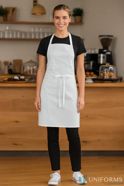 Smiling female barista in JBs Bib Apron Without Pocket work uniforms and white sneakers