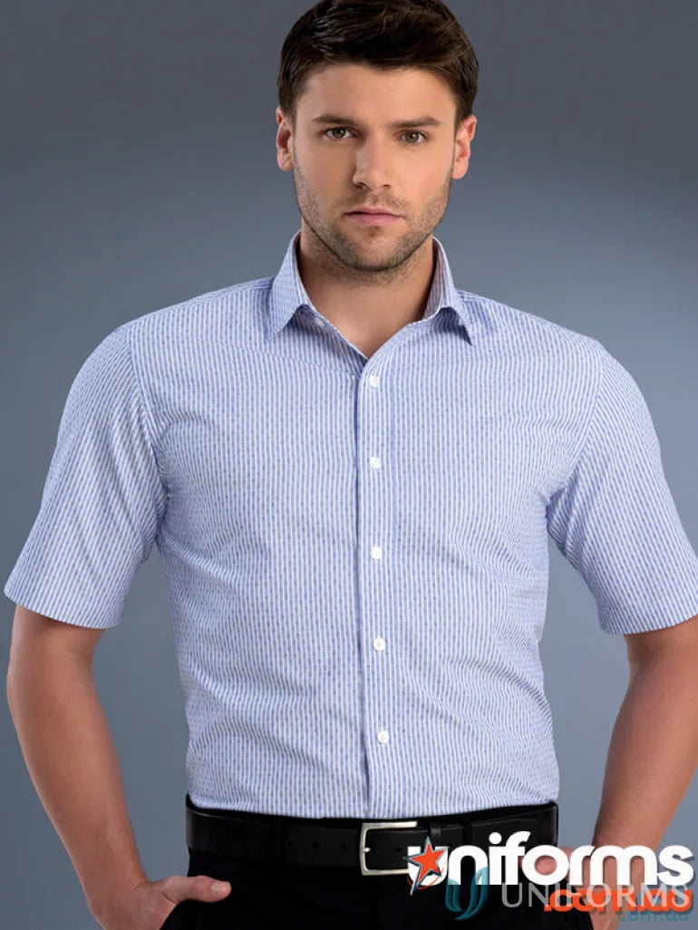 Man wearing a light blue and white pinstriped slim fit dobby stripe shirt from 870-jk Keval
