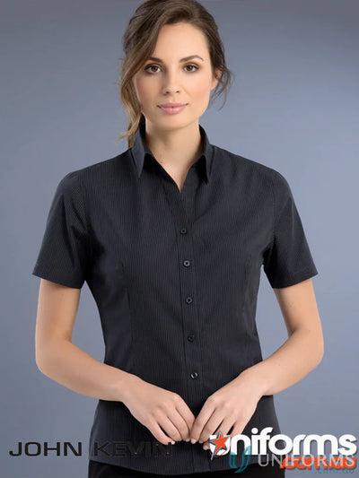 A woman wearing a Keval Slim Fit SS Dark Stripe shirt with subtle vertical stripes