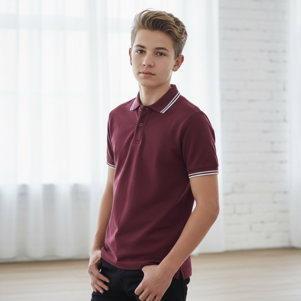 Kids contrast polo in maroon with white trim on collar cuffs