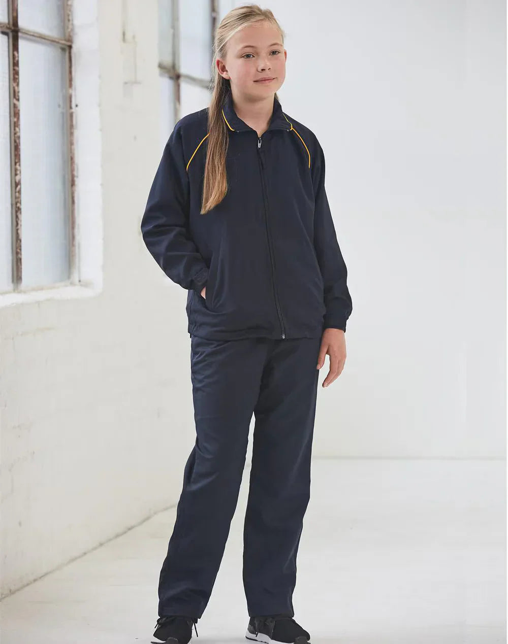 Navy blue spirit kids champion track pants with yellow piping