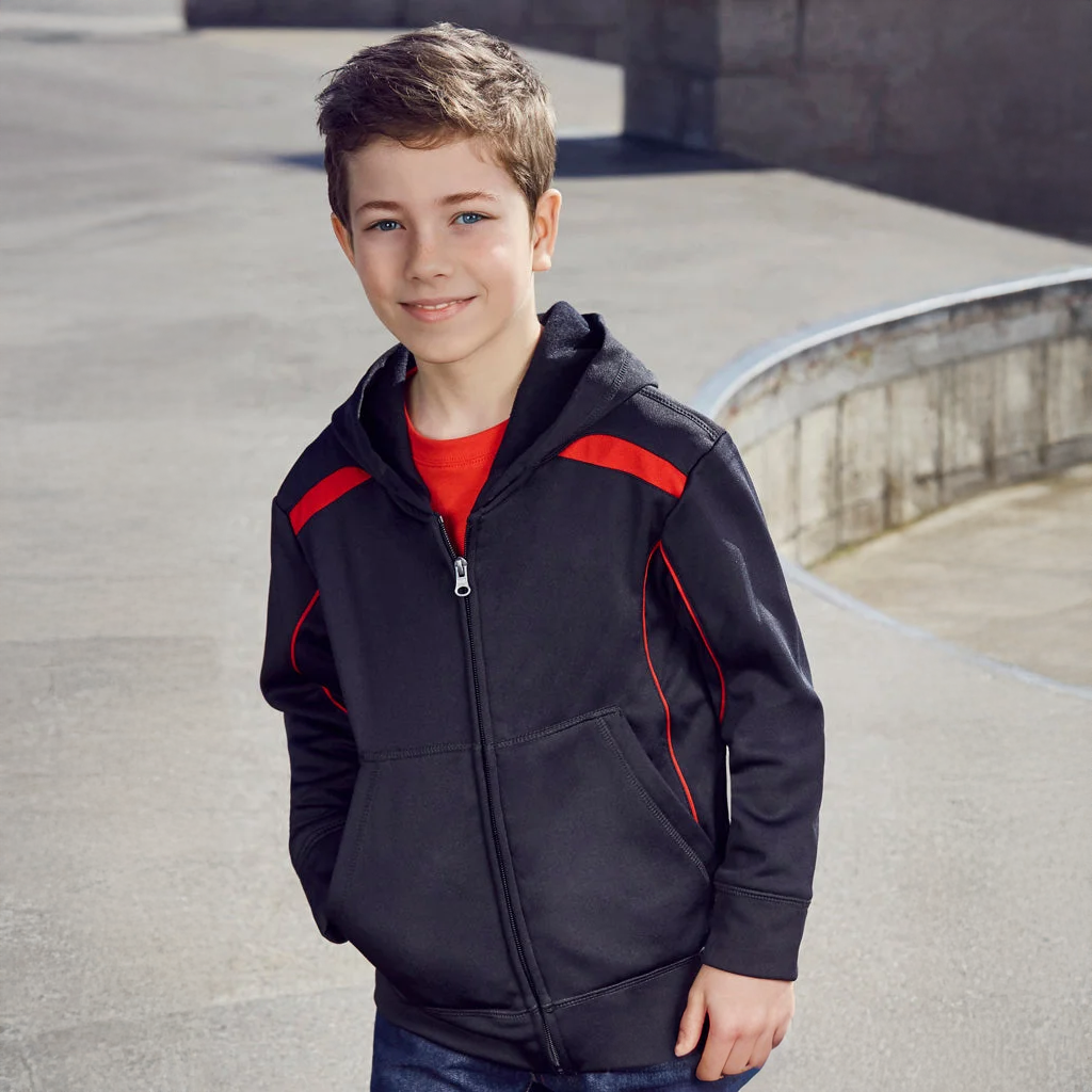 Young boy in Kids United contrast hoodie with black zip-up and red accents