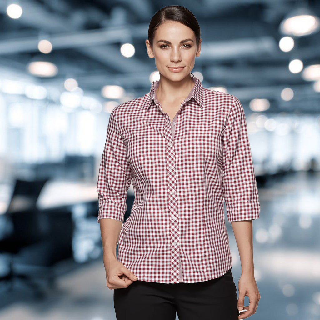 Woman in Brighton lady shirt, red white checkered 3Q sleeves