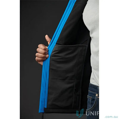 Woman wearing ladies cascades softshell with internal pocket and adjustable cuffs for outdoor fun