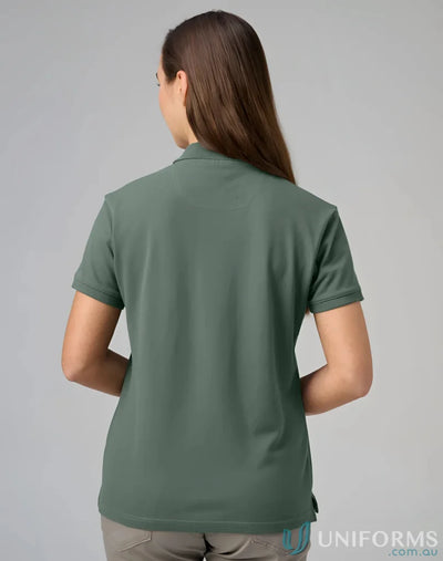 Womans green polo shirt from PS56 Darling Harbour with a winning spirit ladies vibe