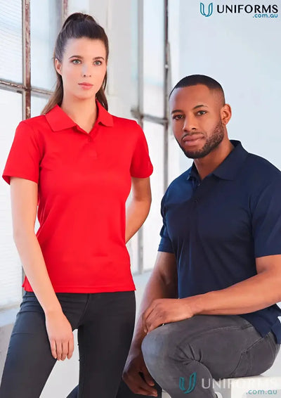 Two people modeling Ladies Verve Polo with cooldry® polyester mini fabric