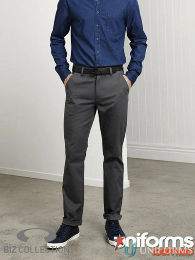 Man in blue shirt and gray Lawson Stretch Chino Pants from Biz Collection Mens