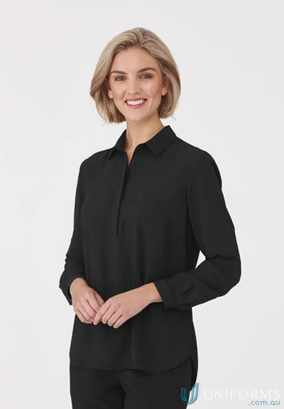 Woman in black collared shirt from Meghan Top, ideal for action fit medical uniforms