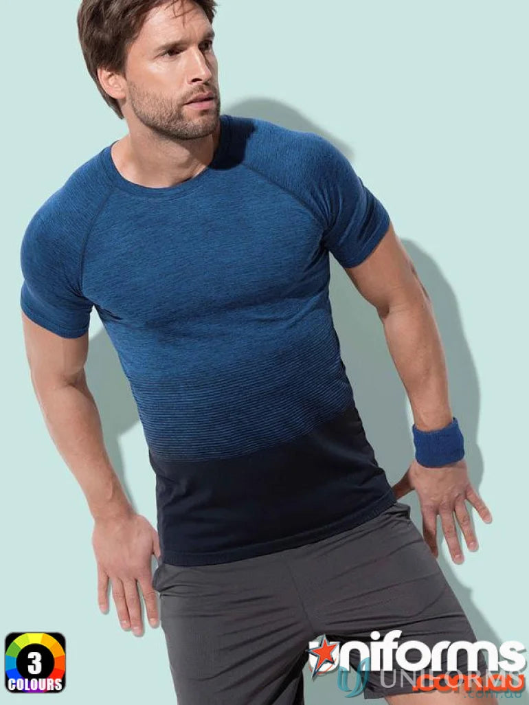 Man in active seamless raglan t-shirt with multi-colour gradient pattern and raglan flow