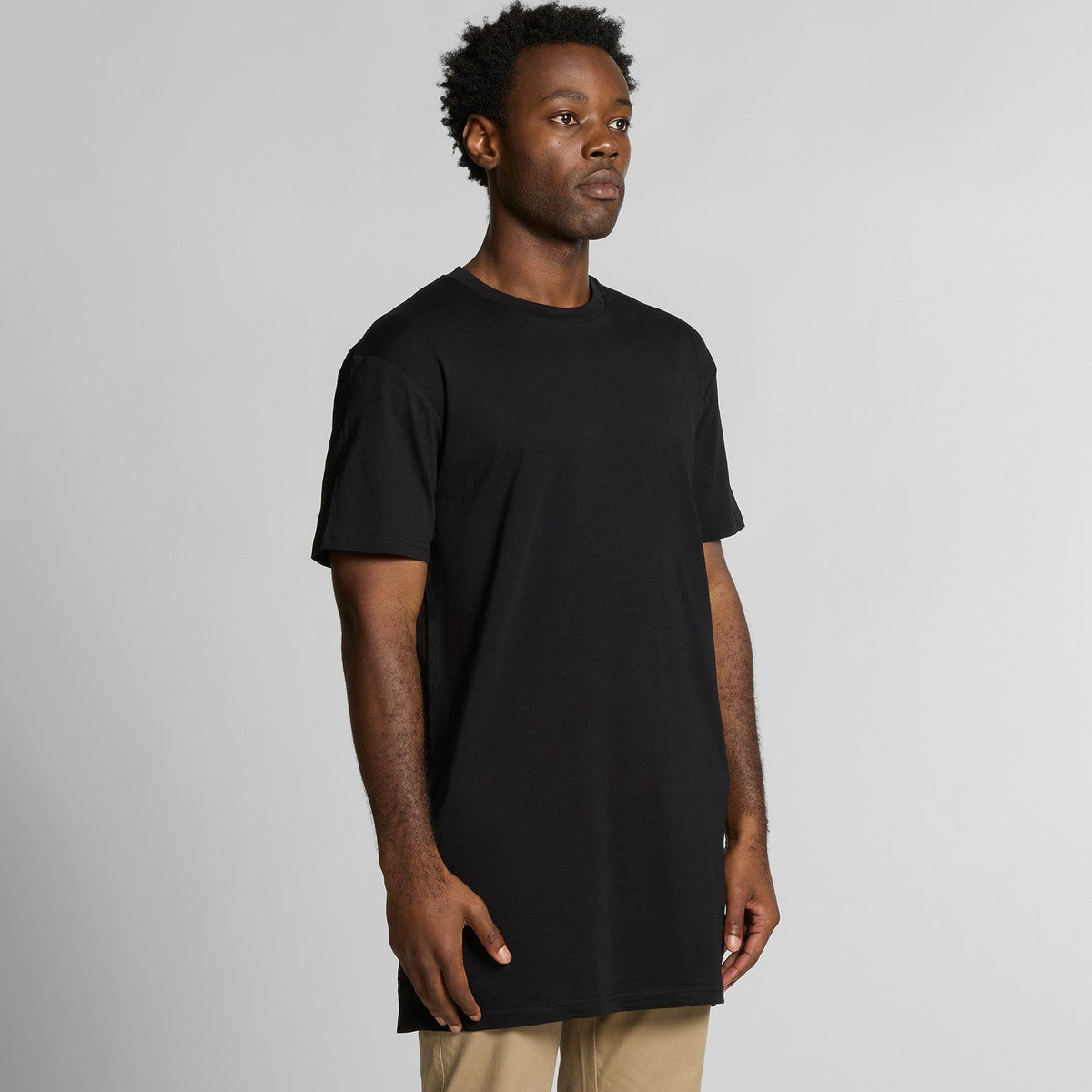 Black crew neck t-shirt with short sleeves and a relaxed fit.