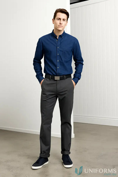 Man in a blue button-down shirt and gray pants wearing a Mens PU Belt for workwear