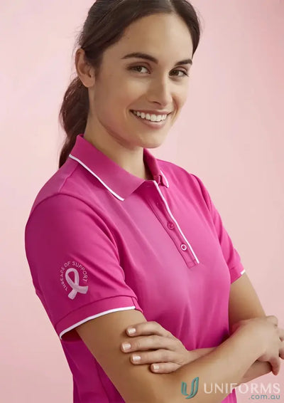 NBCF Ladies Pink Polo shirt with white trim, perfect for bizcare women’s pink style