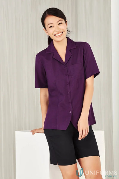 Woman in purple Oasis Plain Overblouse made with Biz ComfortCool fabric from Collection Oasis Plain