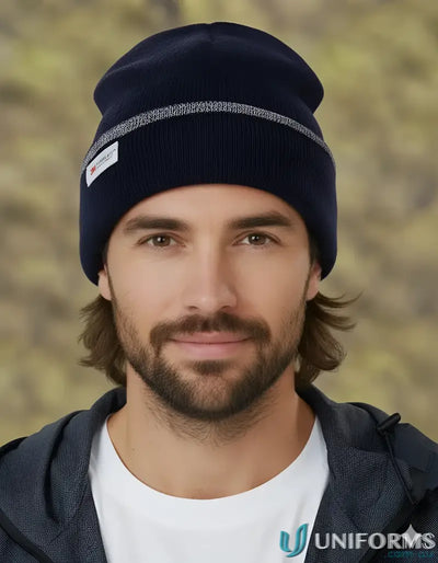 Navy blue Thinsulated cuff beanie with reflective stripe and white tag for warmth