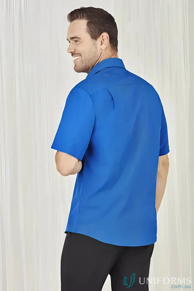 Man wearing mens oasis short sleeve shirt in blue - perfect mens oasis shirt look