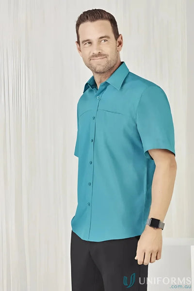 Man in teal Mens Oasis Short Sleeve Shirt, perfect for casual style