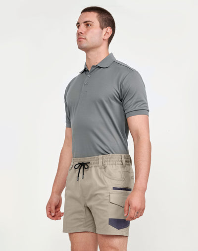Man in Planett wp29 unisex cotton stretch cuffed short, gray polo and beige cargos