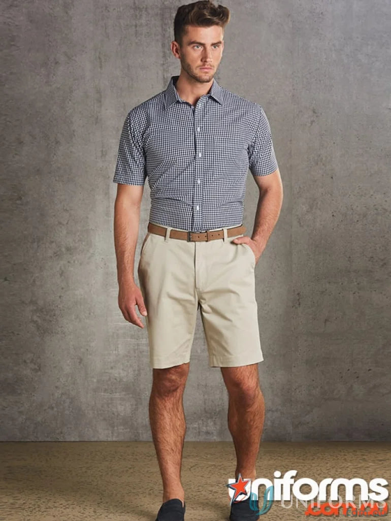 Man in checked shirt and khaki shorts wearing Pool Mens Chino Shorts for a casual look