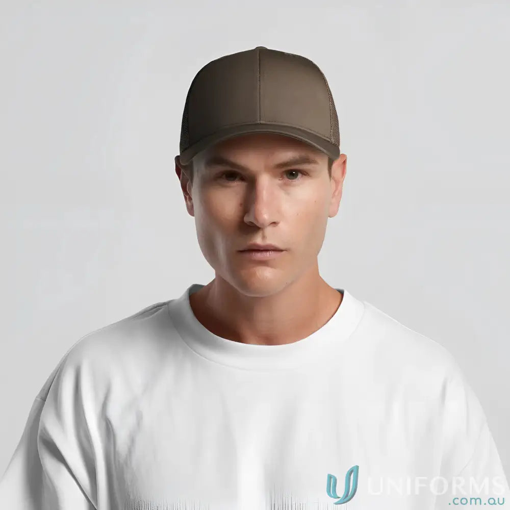 Man wearing a solid dark brown recycled polyester trucker cap with shallow curved brim