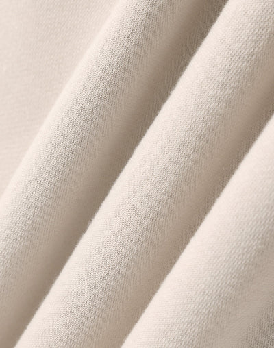 Premium oversized bone hoodie made of soft cream cotton fabric with subtle texture great for workwear uniforms