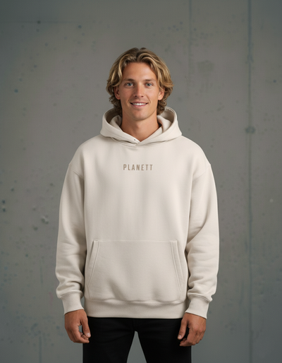 Cream-colored premium oversized bone hoodie made of soft cotton with subtle planett logo perfect for work uniforms or workwear